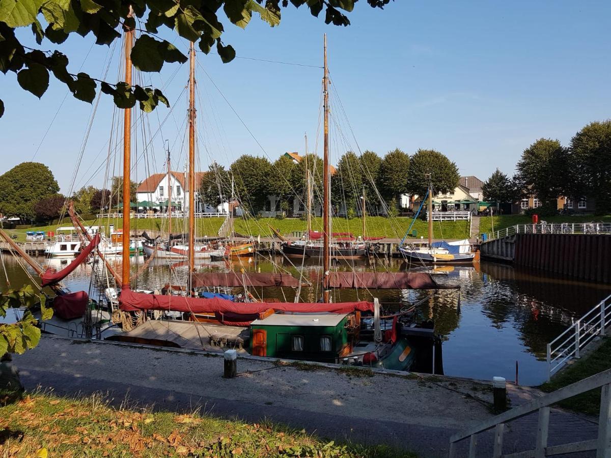 Ferienglück an der Nordsee: Erdgeschoss-Ferienwohnung mit Kamin und Garten Altfunnixsiel Exterior photo